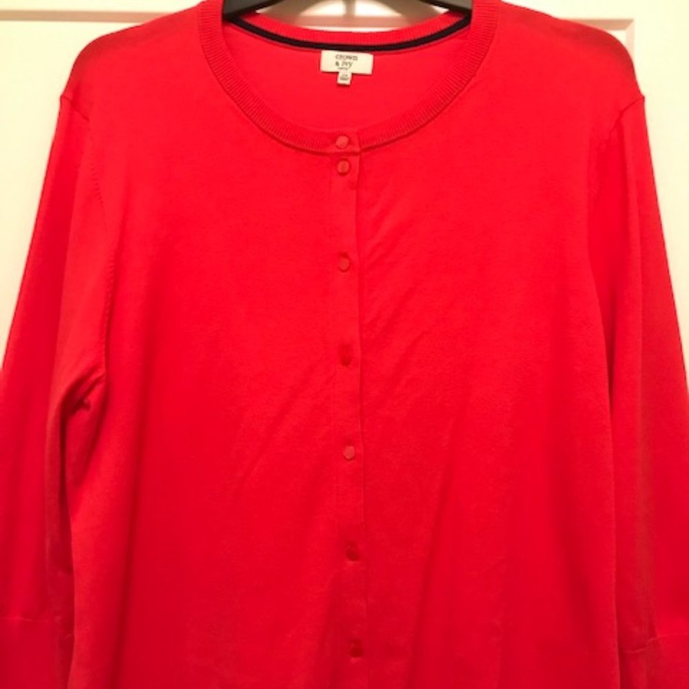 Red cardigan sweater with inside navy trim